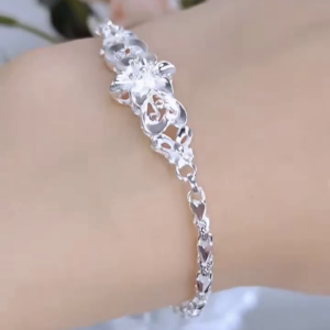 Elegant Sterling Silver Floral Link Bracelet with Intricate Openwork Design