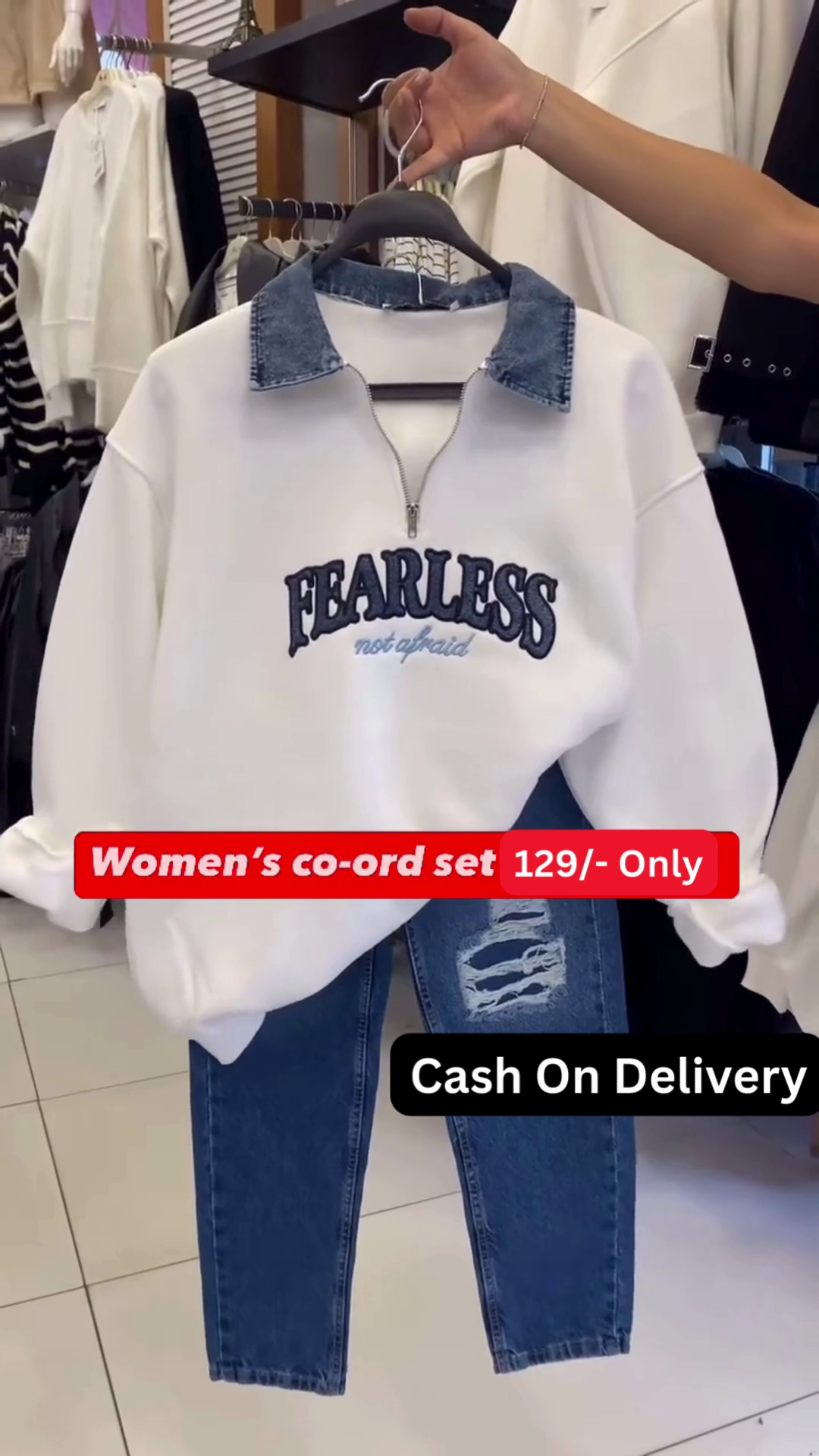 Trendy Women's White Sweatshirt Co-ord Set with "Fearless" Graphic and Distressed Jeans