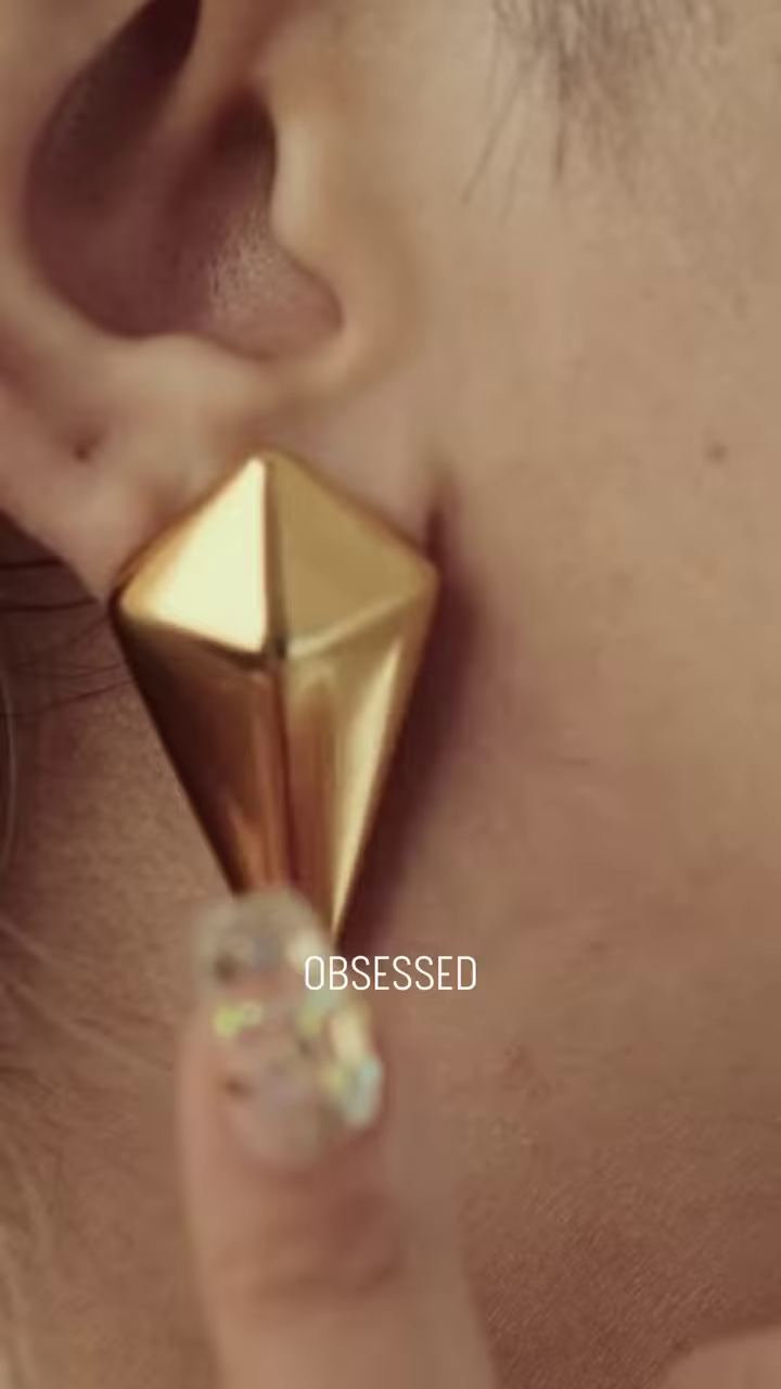 Close-Up of Stylish Gold-Toned Earrings: Teardrop, Stud, and Mesh Hoop - Image 2