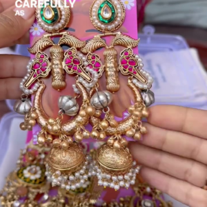 Exquisite Gold-Toned Jhumka Earrings with Kundan, Gemstones, and Pearl Details