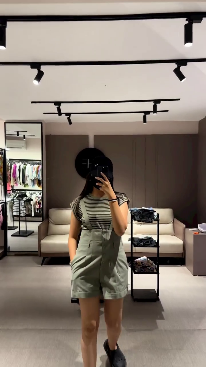 Casual Women's Olive Green Overall Shorts with Striped Tee - Image 3