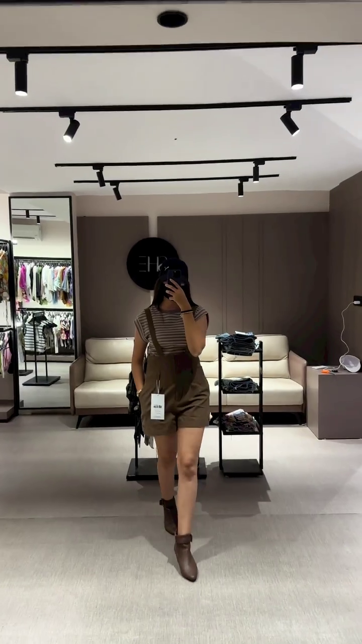 Casual Women's Olive Green Overall Shorts with Striped Tee - Image 2