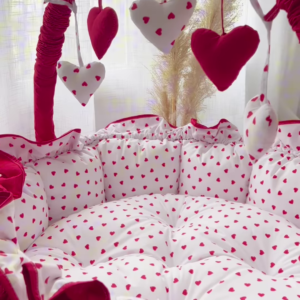 Cozy Baby Bassinet with Heart Print and Hanging Heart Mobiles