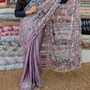 Ethereal Mauve Floral Sequinned Net Saree – A Masterpiece of Grace